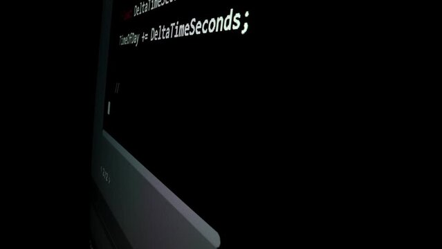 Closeup macro shot movement of coding script moving across LED screen with real-time AI-generated typing, showcasing advanced AI learning in optimization, debug and coding for software development.