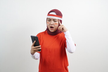 Woman celebrating independence day, thinking, holding phone