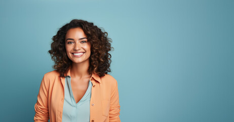 Smiling Woman Against a Solid Color Background - obrazy, fototapety, plakaty