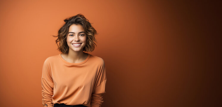 Smiling Woman Against a Solid Color Background
