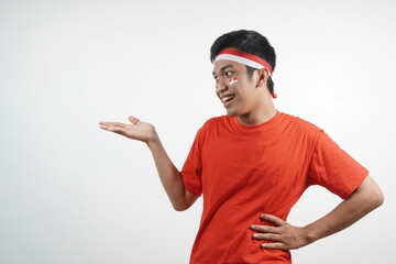 Naklejka premium Man pointing at something - Indonesia independence day