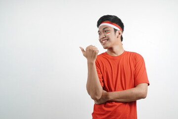 Naklejka premium Man pointing at something - Indonesia independence day