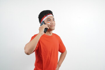 Asian man is celebrating independence day by calling.