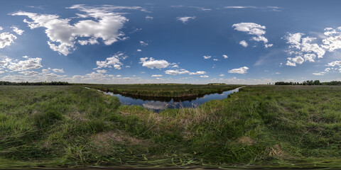 spherical 360 hdri panorama among green grass farming field near melioration reclamation canal in equirectangular seamless projection, as sky dome replacement, game development as skybox or VR content