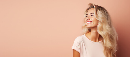 Smiling young woman with blonde long groomed hair isolated on pastel flat background with copy...