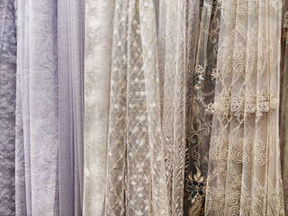 The fabric is tulle, chiffon, and transparent white curtains. Abstract background, texture, pattern. Space for text and copy space