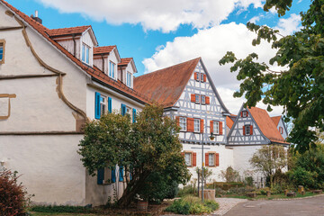 Traditional small house with beautiful outdoor decor facade in Germany. German old brick building house ancient European city German architect