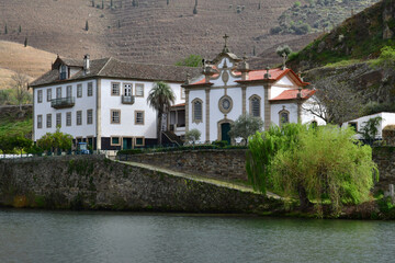 Fototapeta na wymiar Douro valley, Portugal - march 25 2022 : the picturesque river near Pinhao