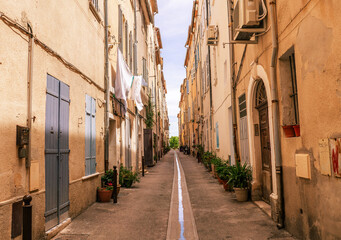 Fototapeta na wymiar typical street in a picturesque village on the french riviera in the mediterranean