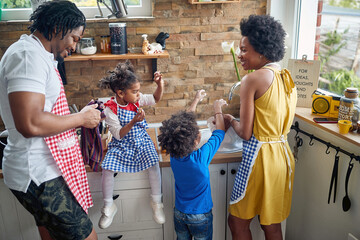 Harmonious Family Moments: Afro-American Parents and Children Bonding in the Kitchen