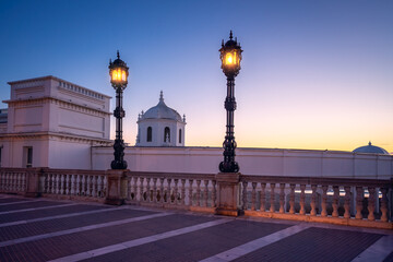 Fototapeta na wymiar Balneario de la Palma Building at La Caleta Beach at sunset - Cadiz, Andalusia, Spain