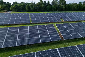 Solar panels on a field of green grass