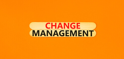 Change management symbol. Concept words Change management on beautiful wooden stick. Beautiful orange table orange background. Business change management concept. Copy space.