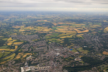 An aerial view of the English countryside as shot from an airplane