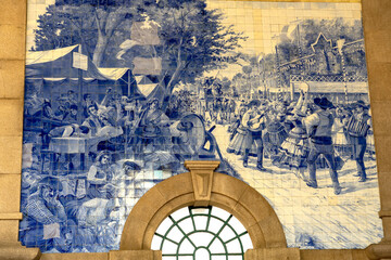 sao bento railway station with beautifully decorated blue and white azulejo tiles in Porto Portugal