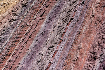 Colorful rock face with different layers - traveling and exploring the beautiful landscape around Torotoro national park in Bolivia, South America