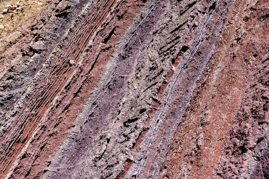 Colorful rock face with different layers - traveling and exploring the beautiful landscape around Torotoro national park in Bolivia, South America