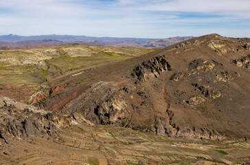 Scenic drive through the remote, peaceful, picturesque and mountainous landscape of the Bolivian Andes - exploring wild places in South America