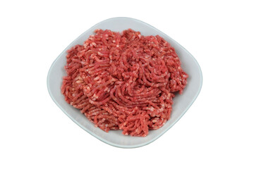 Bowl of mince isolated on white background. Homemade minced meat comes out of the meat grinder....