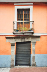 Street view of an old building facade, architecture background, Quito, Ecuador.