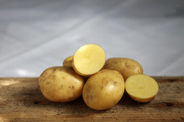 Potatoes on a wooden table
