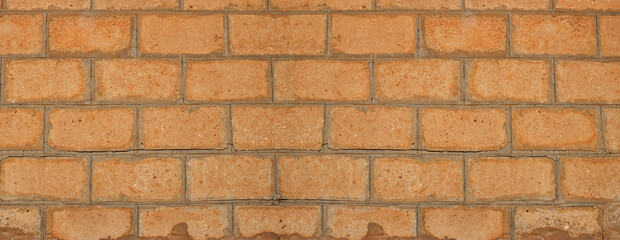 Weathered stained old brick wall background