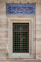 Fototapeta na wymiar a window of the suleiman mosque allows people during prayer time