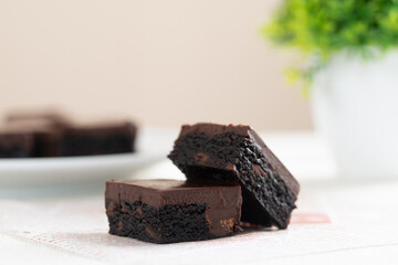 Homemade caramel chocolate brownies with dark chocolate ganache.