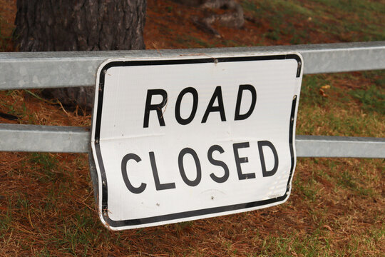 bent road closed sign