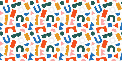 Fun colorful geometric shape seamless pattern. Creative abstract children style art background for kid education or trendy design with playful geometry shapes. Simple childish wallpaper texture.