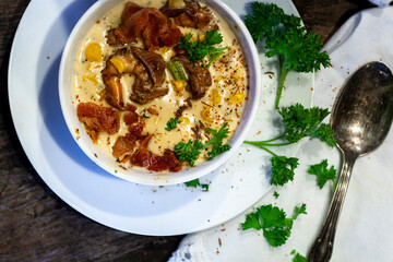 Crab and corn bisque or chowder in blue and white crockery.