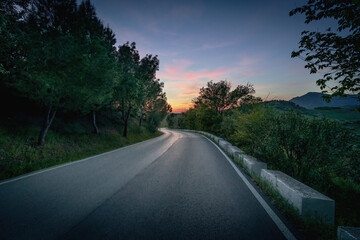 Asphalt road at sunset - Zahara de la Sierra, Andalusia, Spain