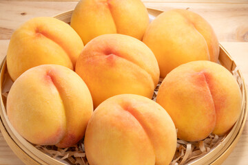 Yellow Peach fruit on wooden background, Fresh Yellow Peach.