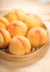 Golden Peach fruit on wooden background, Fresh Yellow Peach.