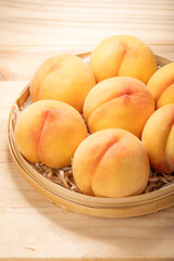 Yellow Peach fruit on wooden background, Fresh Yellow Peach.