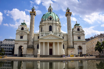 Fototapeta na wymiar Reflections of the Karlskirche - Vienna, Austria