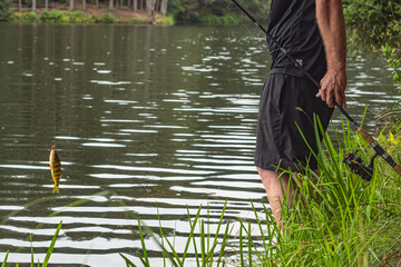 Fresh water lake spring season man shore fishing