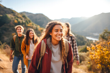 A group of teenagers hiking and enjoying nature, a group of young friends exploring the great outdoors, embracing an active lifestyle in nature - obrazy, fototapety, plakaty