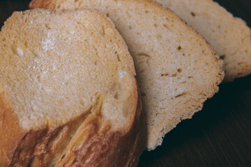 Delicious croutons. Pieces of roasted white bread. Macro shot. Sliced bread.
