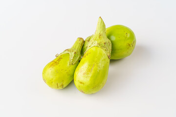 Fresh small eggplants on a pure white background