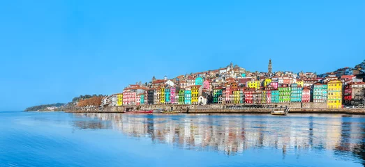 Fotobehang Portugal, Porto - Panoramic view of colorful medieval houses at Douro river bank in Oporto old town - Portuguese landmark city © Armando Oliveira