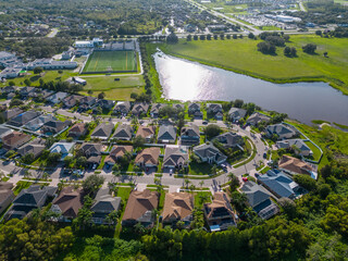 UAV photo of neighborhood near Clearwater Florida with city scene and green scenery from aerial view