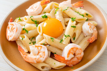 penne pasta white cream sauce with shrimps and egg