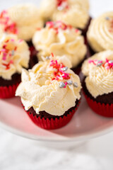 Red Velvet Cupcakes with White Chocolate Ganache Frosting