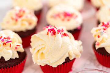 Red Velvet Cupcakes with White Chocolate Ganache Frosting
