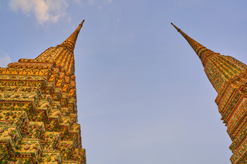 chedi wat pho buddha complex in bangkok, thailand.