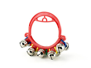 tambourine toy with silver bell isolated on white, colorful music instrument for children play and learn about rhythm