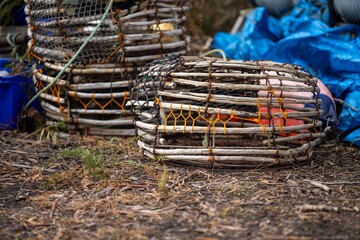 crayfish cray pots on the back of a fishing boat in tasmania australia in spring