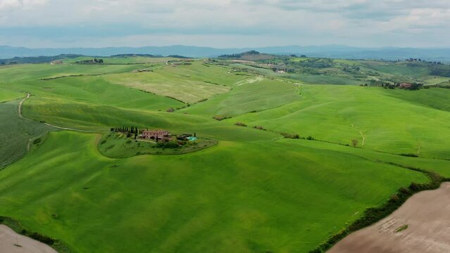 Tuscany green fields in spring Italy Aerial view