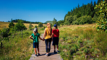 Family on a trekking day in Auvergne region in France